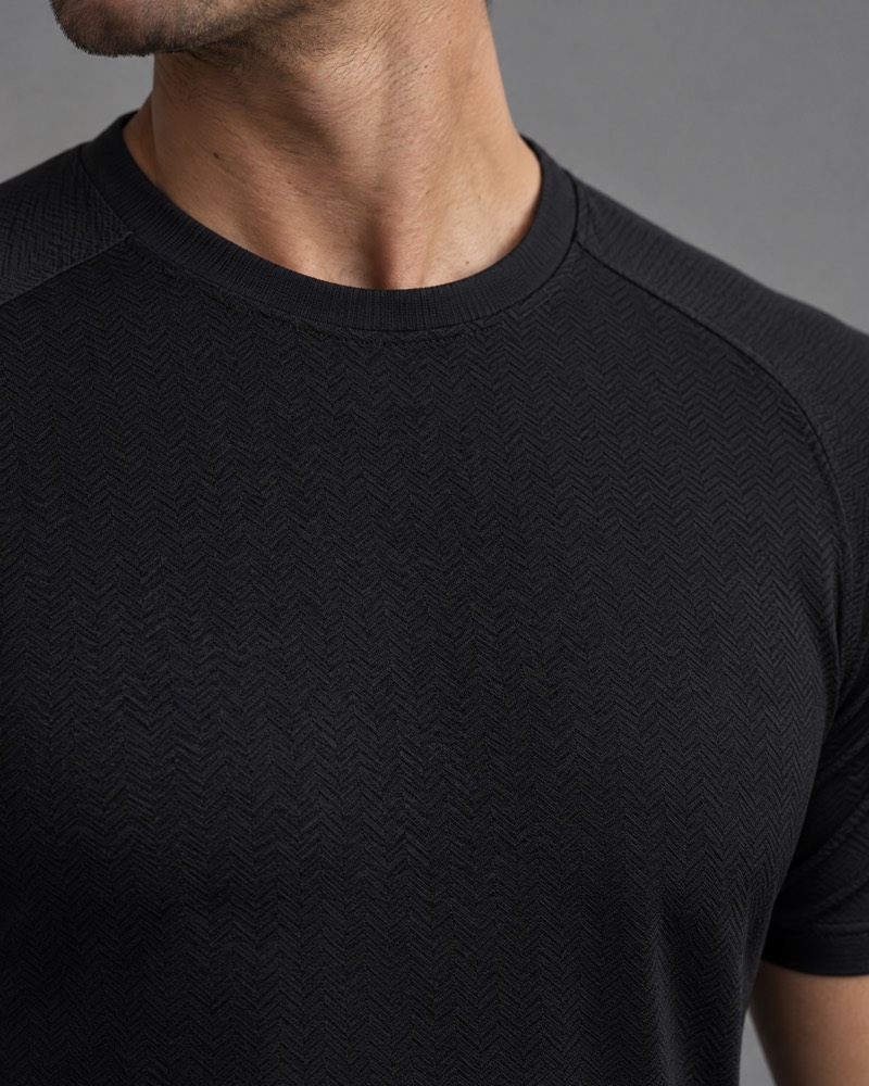 Onyx training tee with a subtle tonal chevron jacquard