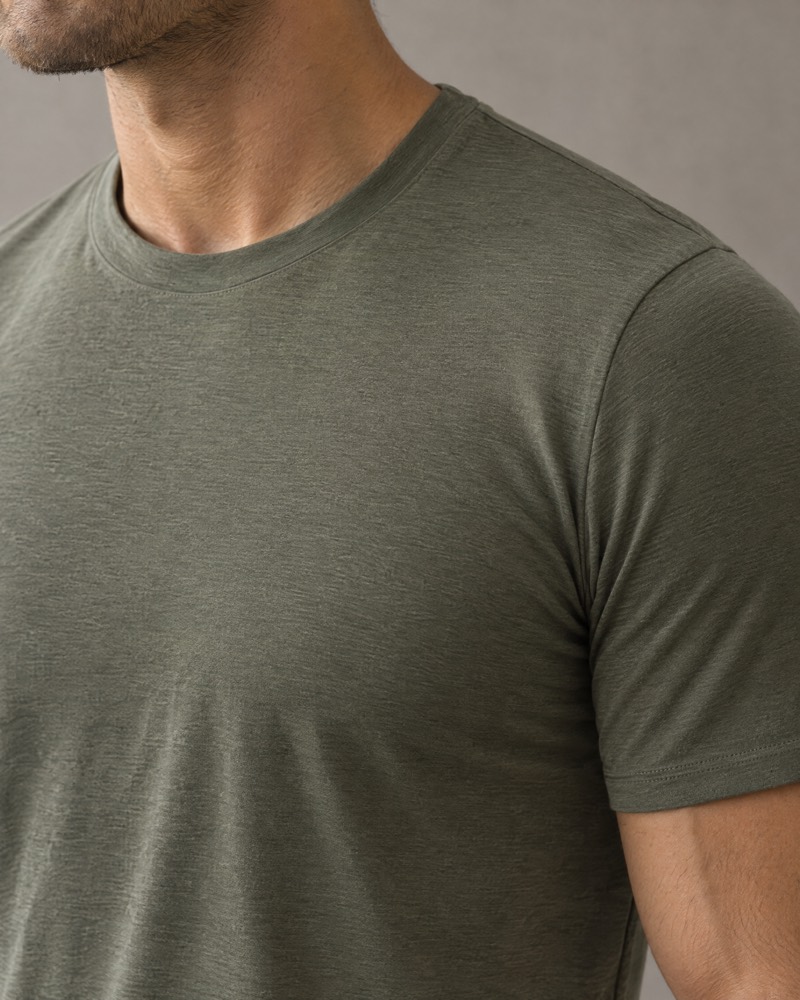 Faded olive modal jersey tee draping over the chest
